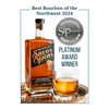 Savor Spear bourbon bottle with a glass of whiskey on a white background, featuring a Platinum Award from Sip Magazine.