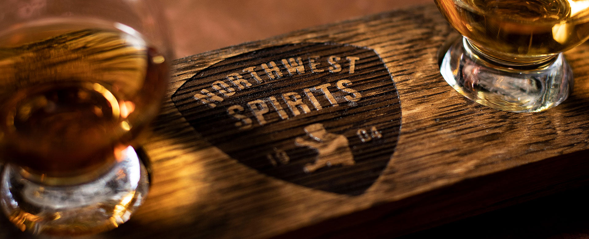 Northwest Spirits logo on wood